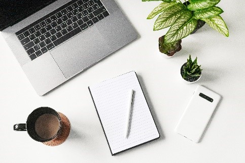 laptop and coffee mug on desk