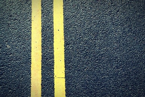 double yellow lines on side of road